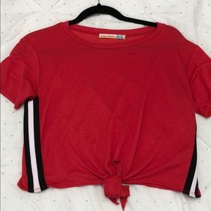 red shirt with tie in front